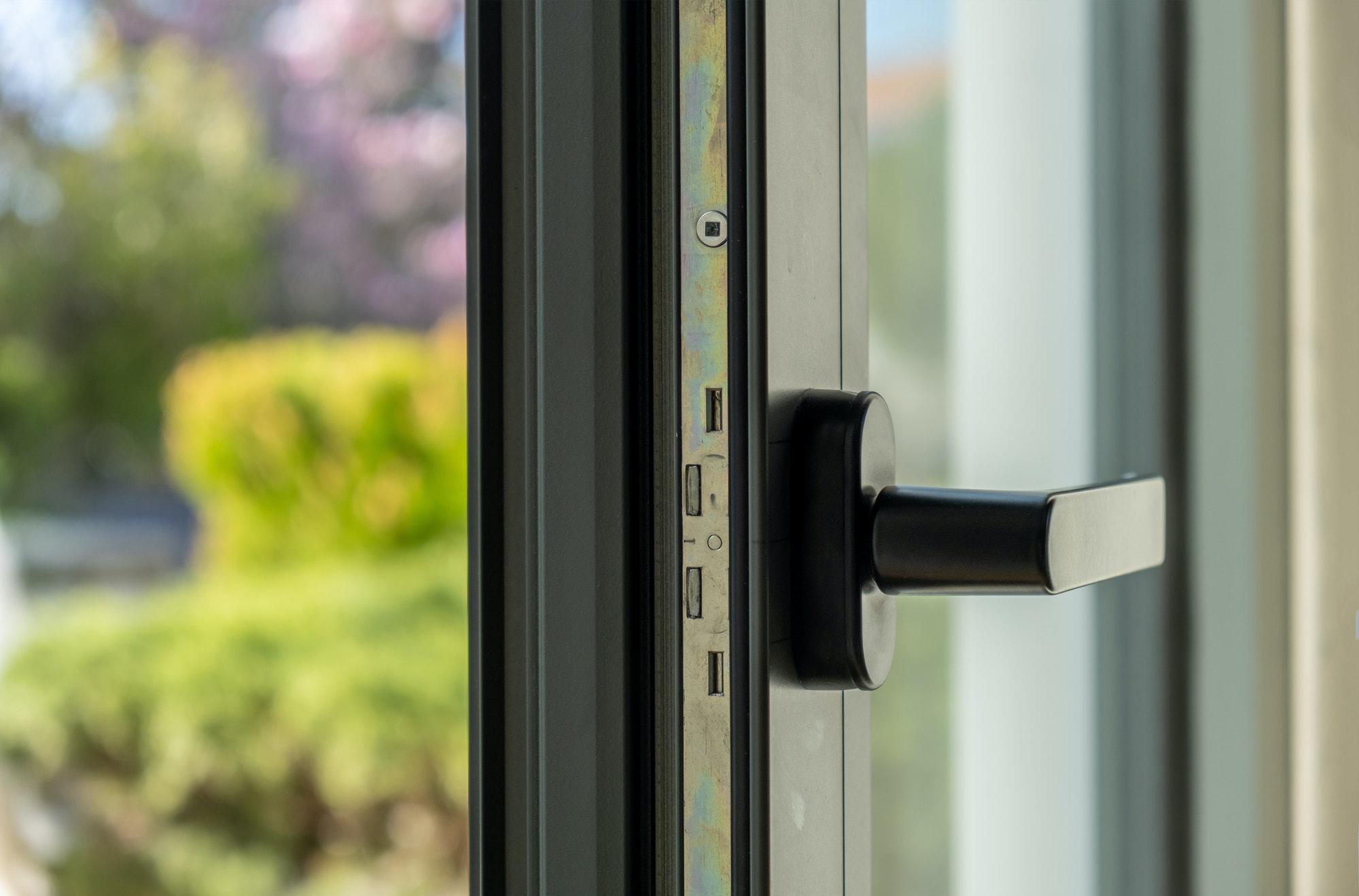 Aluminum window open detail. Metal door frame closeup view.